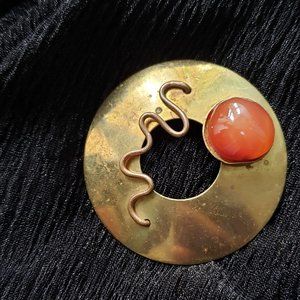 Abstract old/ Brass Tone Round Brooch with Amber/ Orange Glass
